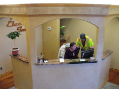 Rachel and James at the Reception Desk